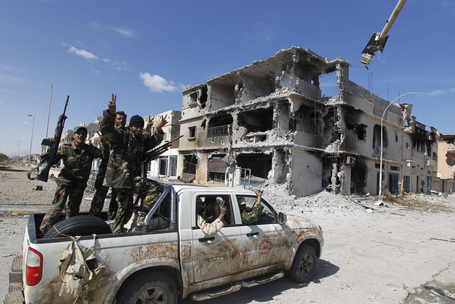 Anti-Gaddafi fighters celebration in the center of Sirte